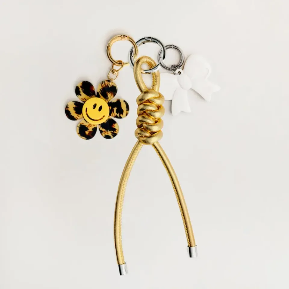 Orelia Bow & Leopard taskevedhæng sæt guld leopard