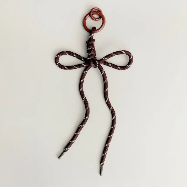Orelia Brown Cord Bow taskecharm brun sløjfe