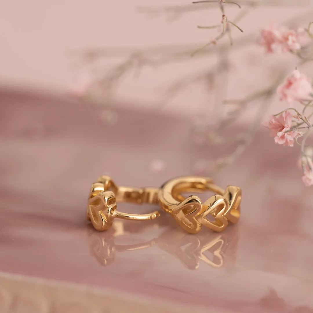 Sisi Copenhagen Amara golden huggie øreringe hjerter par forgyldt