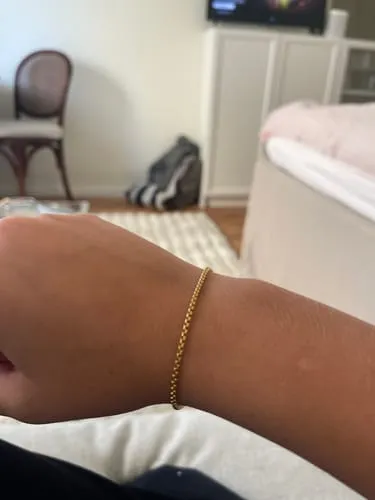 TIMI OF SWEDEN Nori Link armbånd stål guld 16+3 cm unisex