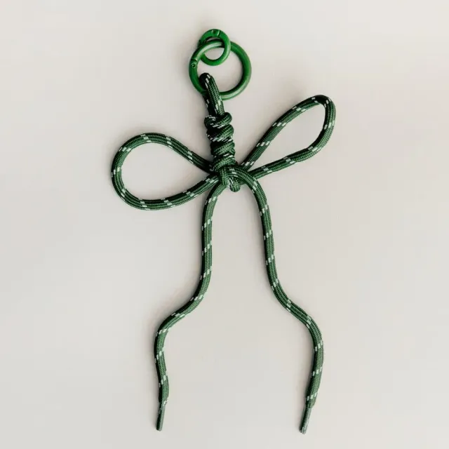 Orelia Green Cord Bow taskevedhæng grøn sløjfe