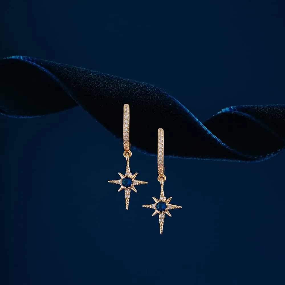 Orelia Blue Crystal Starburst huggie hoops guld blå