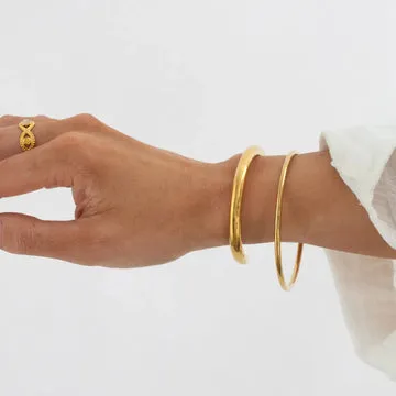 TIMI OF SWEDEN Maeve Statement bangle vandfast guld
