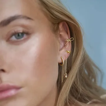 TIMI OF SWEDEN Juliette bow stud øreringe guld 9x6 mm