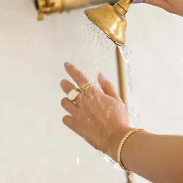 TIMI OF SWEDEN Braid Bangle armbånd forgyldt stål