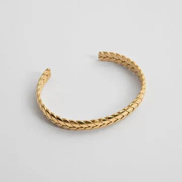 TIMI OF SWEDEN Braid Bangle armbånd forgyldt stål