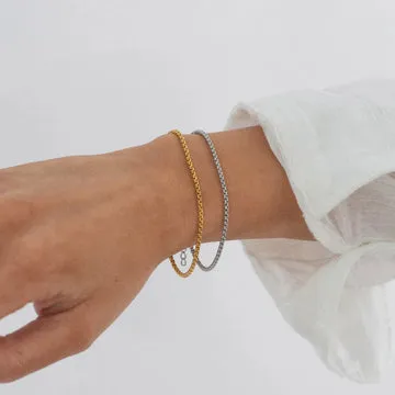TIMI OF SWEDEN Nori Link armbånd stål guld 16+3 cm unisex