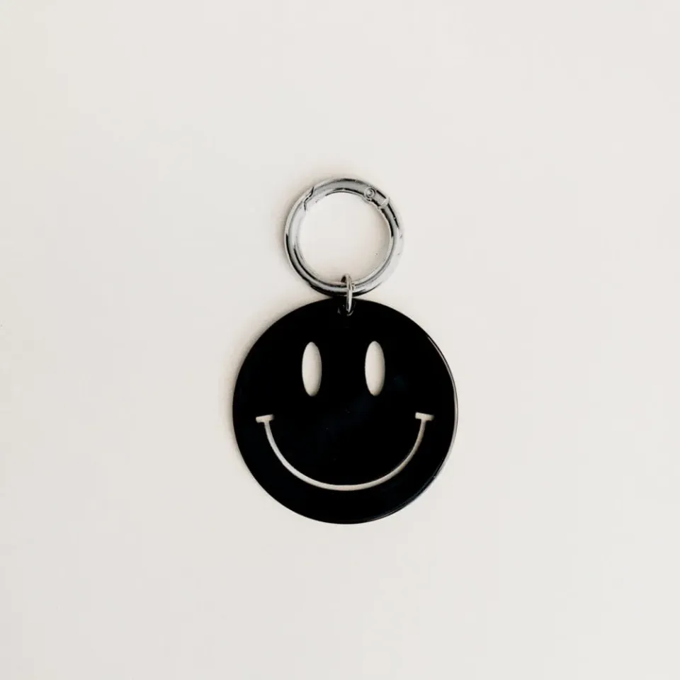 Orelia Happy Face taskevedhæng sort smiley