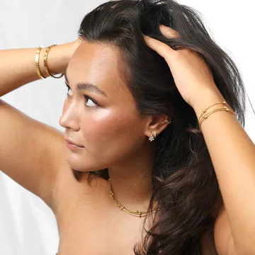 TIMI OF SWEDEN Georgie ear cuff blomst forgyldt