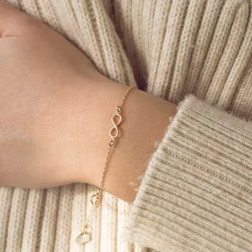 TIMI OF SWEDEN Infinity armbånd forgyldt gaveklar