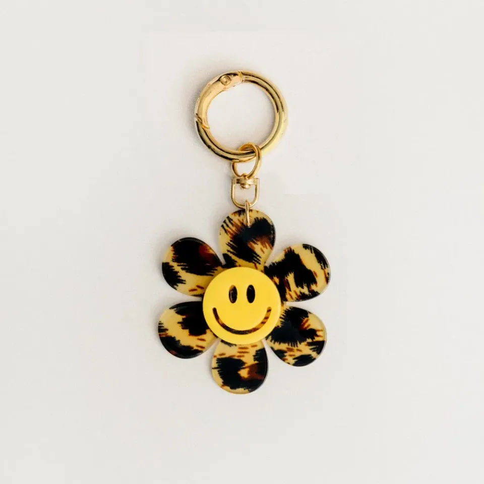 Orelia Animal Print Happy Face Flower taskevedhæng blomst