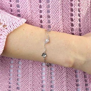 TIMI OF SWEDEN Mae blomster armbånd forgyldt stål