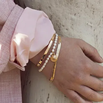 TIMI OF SWEDEN Mermaid Shell perle armbånd forgyldt