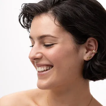 TIMI OF SWEDEN Xiao flower ear cuff forgyldt