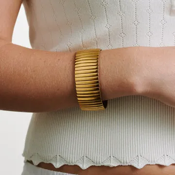 TIMI OF SWEDEN Cisi stretch armbånd guld rustfrit stål